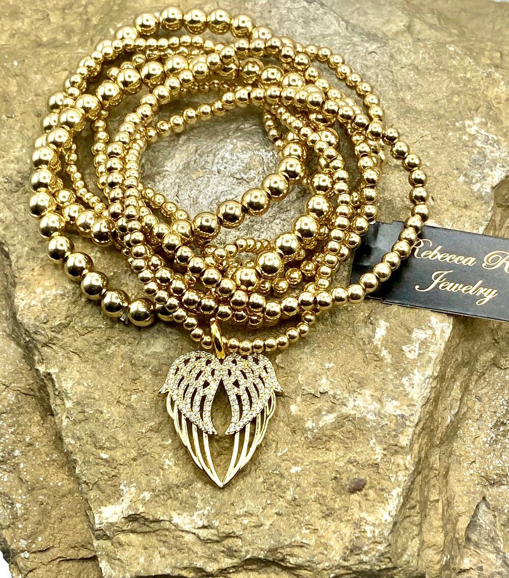 Golden Angel Wing Bracelet Stack | Set of 7 | Crystal Accent Charm